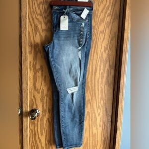Size 16W. Pair of ripped jeans from Maurice’s